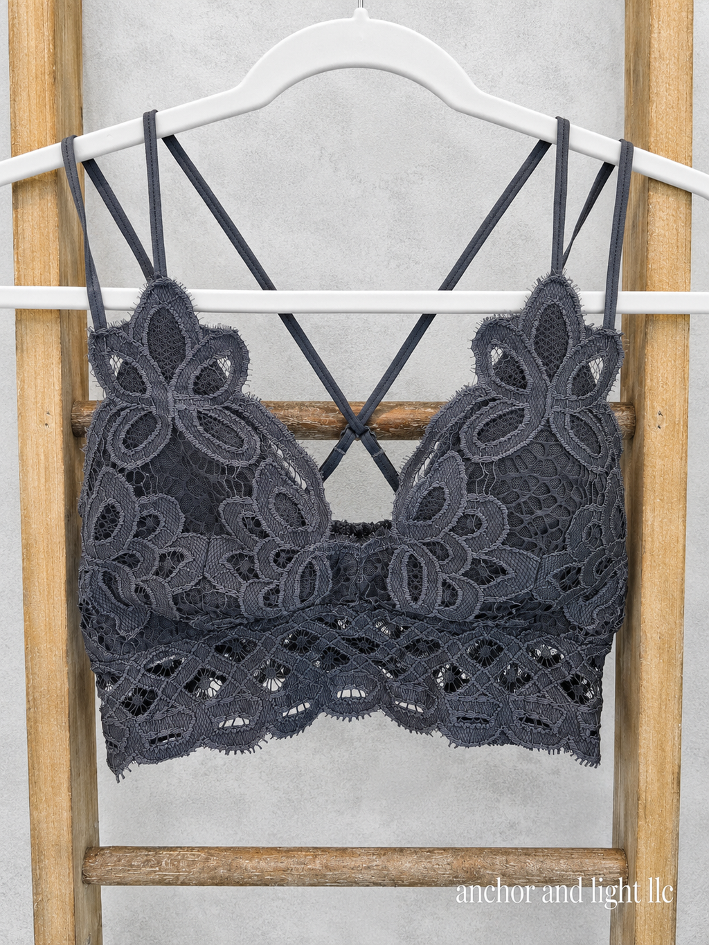 Charcoal scalloped floral lace bralette with adjustable straps and crisscross back