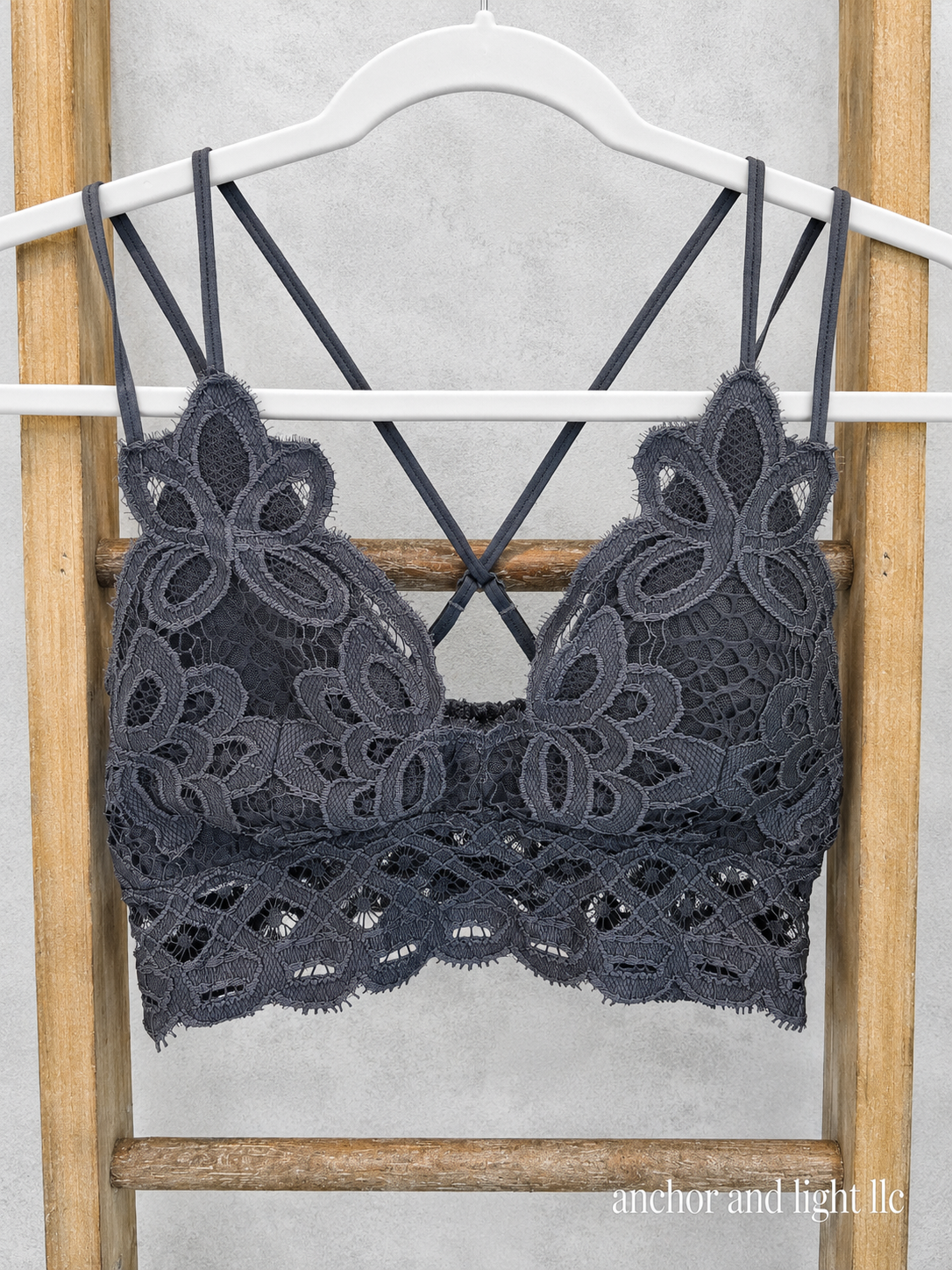 Charcoal scalloped floral lace bralette with adjustable straps and crisscross back