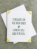 A white greeting card with dark green text reading 'CONGRATS ON THE NEW BABY. & I KNEW YOU HAD IT IN YOU.